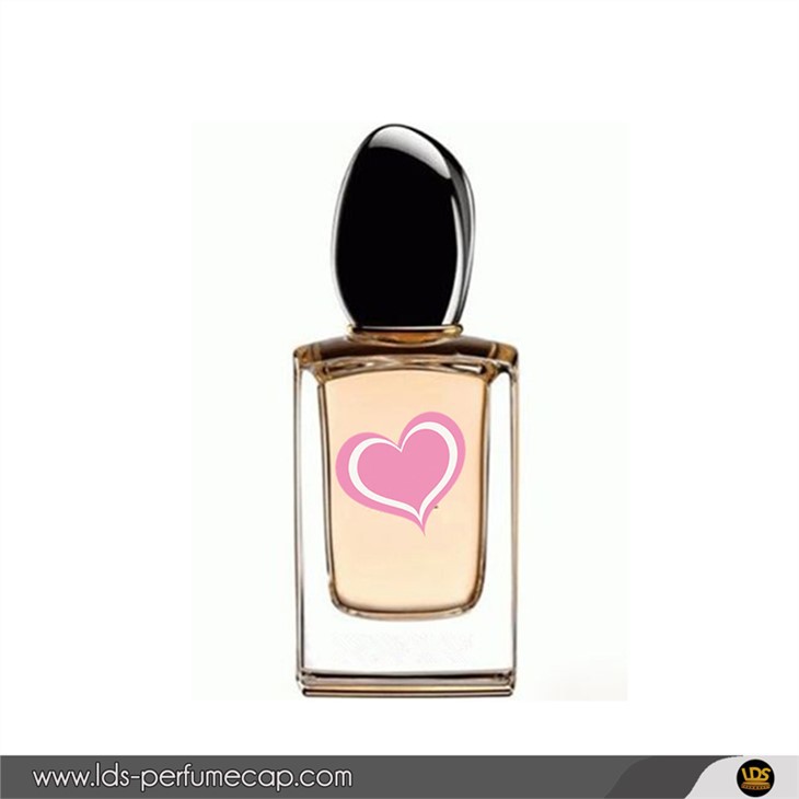 Nwa plastik pafen kouvèti ak boutèy an vè